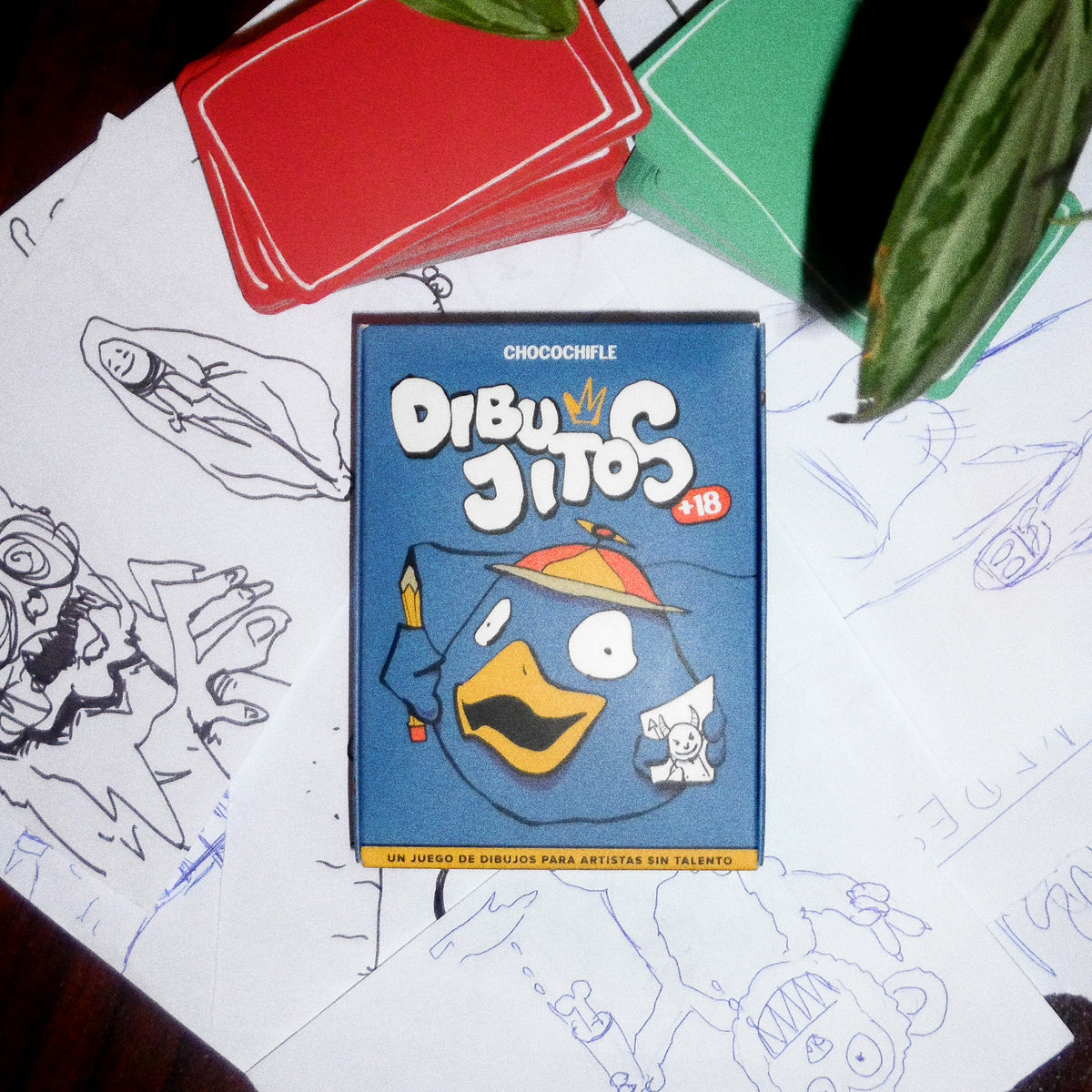 Dibujitos con sus dos mazos sobre los dibujos de una partida